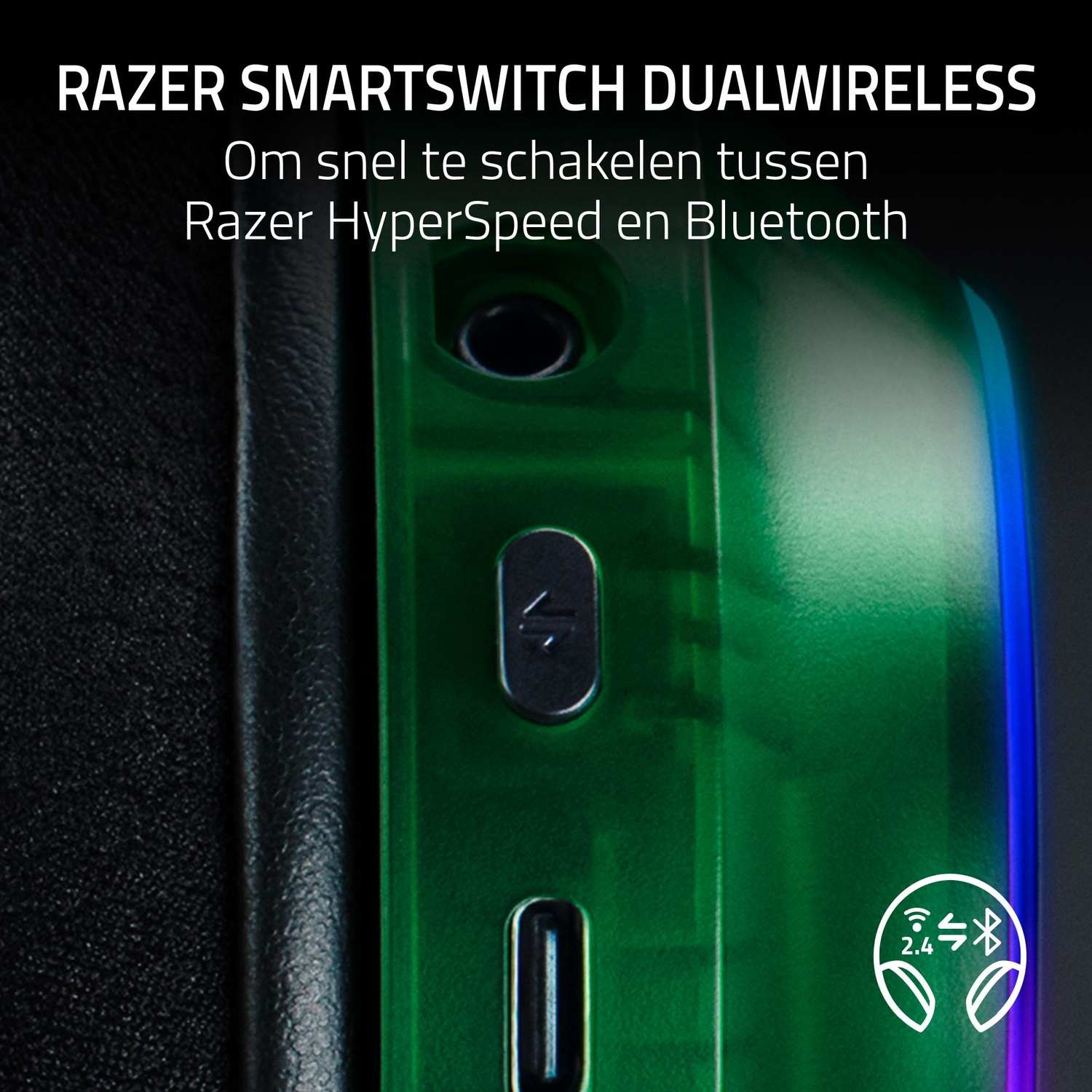 Gros plan d'un appareil Razer vert, avec des boutons et une icône de casque. Le texte indique 'RAZER SMARTSWITCH DUALWIRELESS'.
