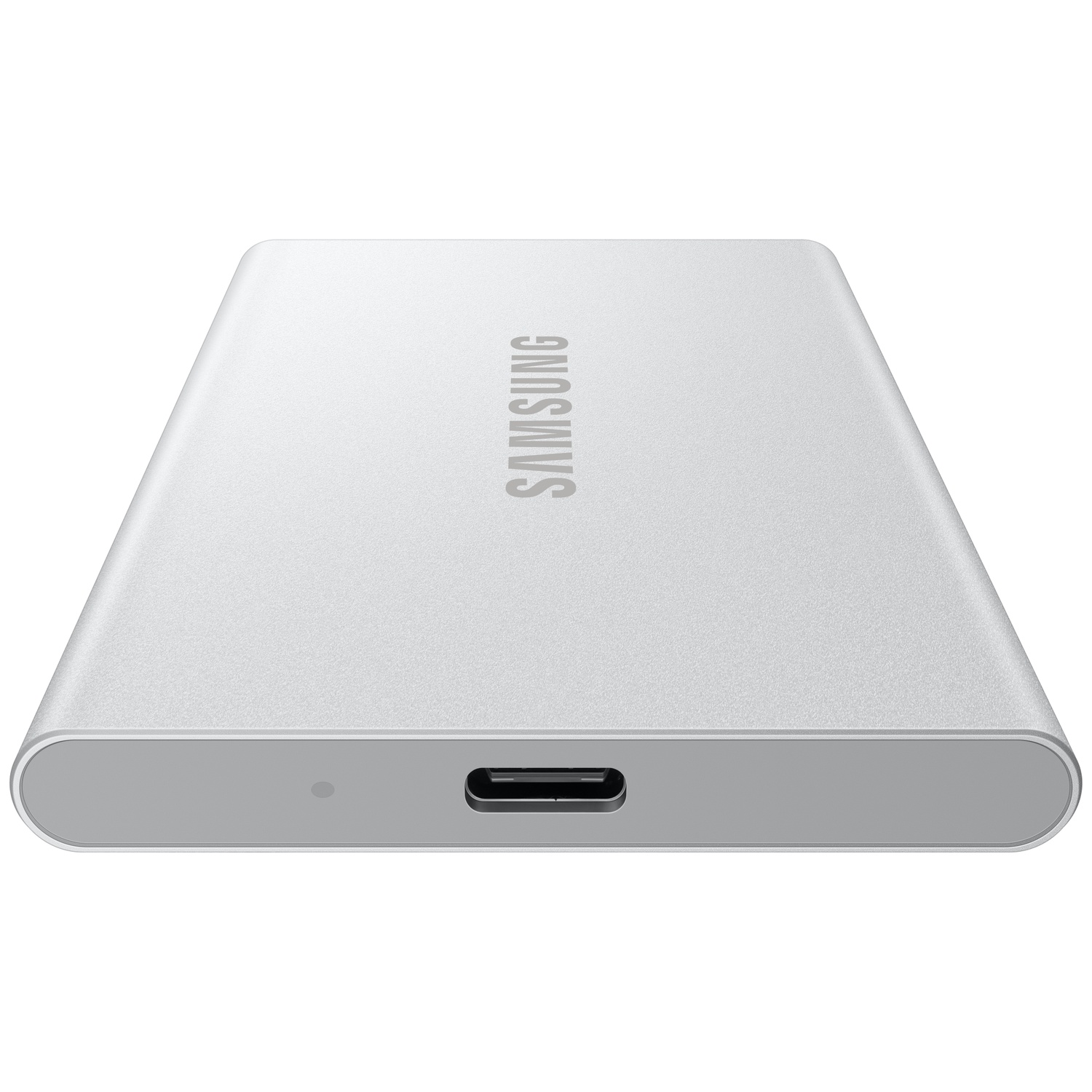 Silver Samsung portable SSD. It has the Samsung logo, a USB-C port, and a small LED indicator. The background is white.