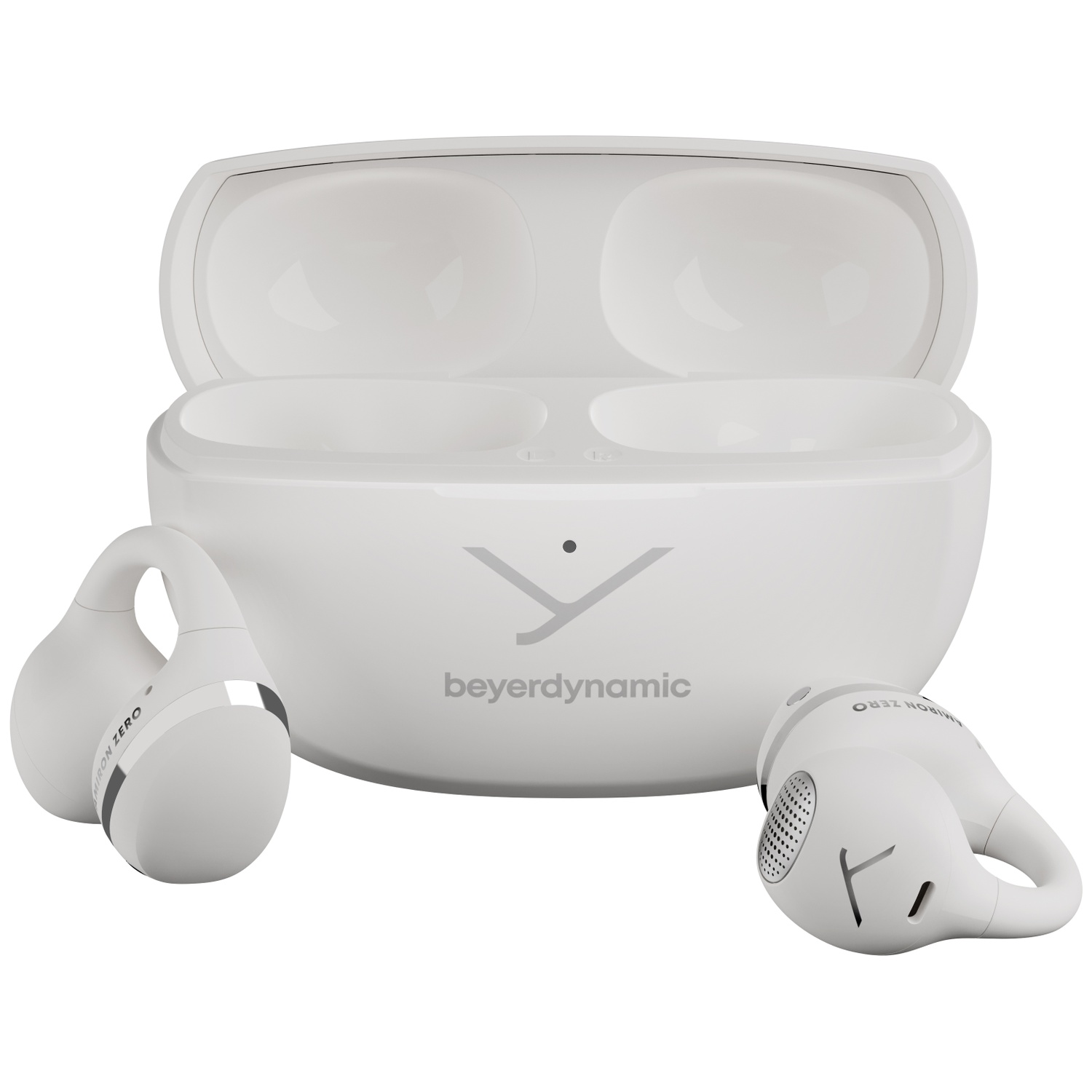Écouteurs sans fil Beyerdynamic blancs et étui de chargement. Les écouteurs sont près de l'étui et portent l'étiquette 'IRON ZERO'.