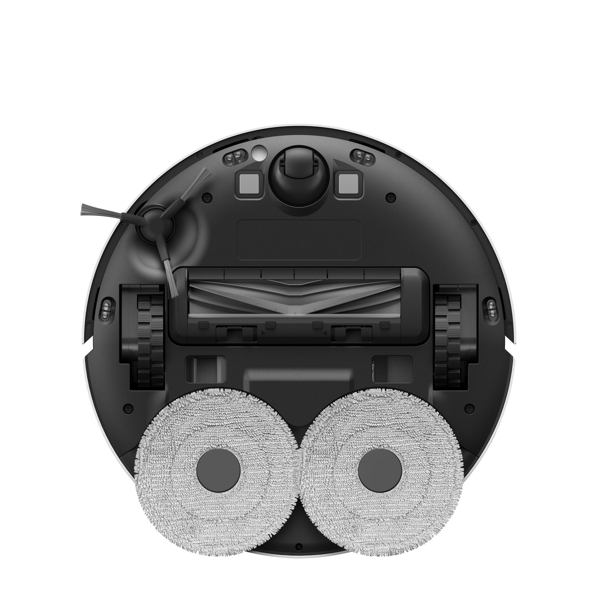 Unterseite eines Roboter-Staubsaugers. Schwarz und weiß. Zwei graue Pads unten. Rotierende Bürste an der Seite.