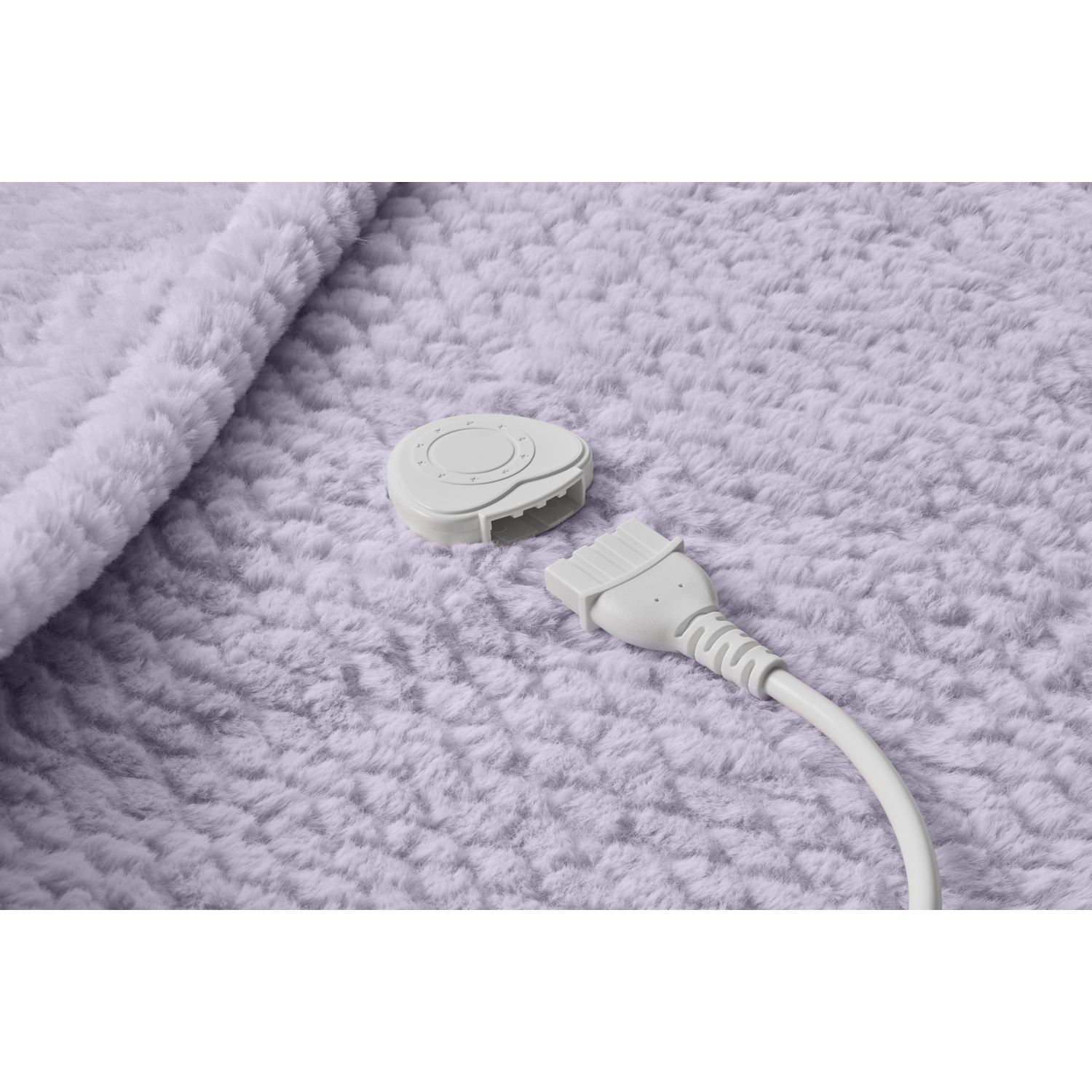 A close-up shows a white heated blanket with a detached power connector. The blanket is fluffy and light gray.
