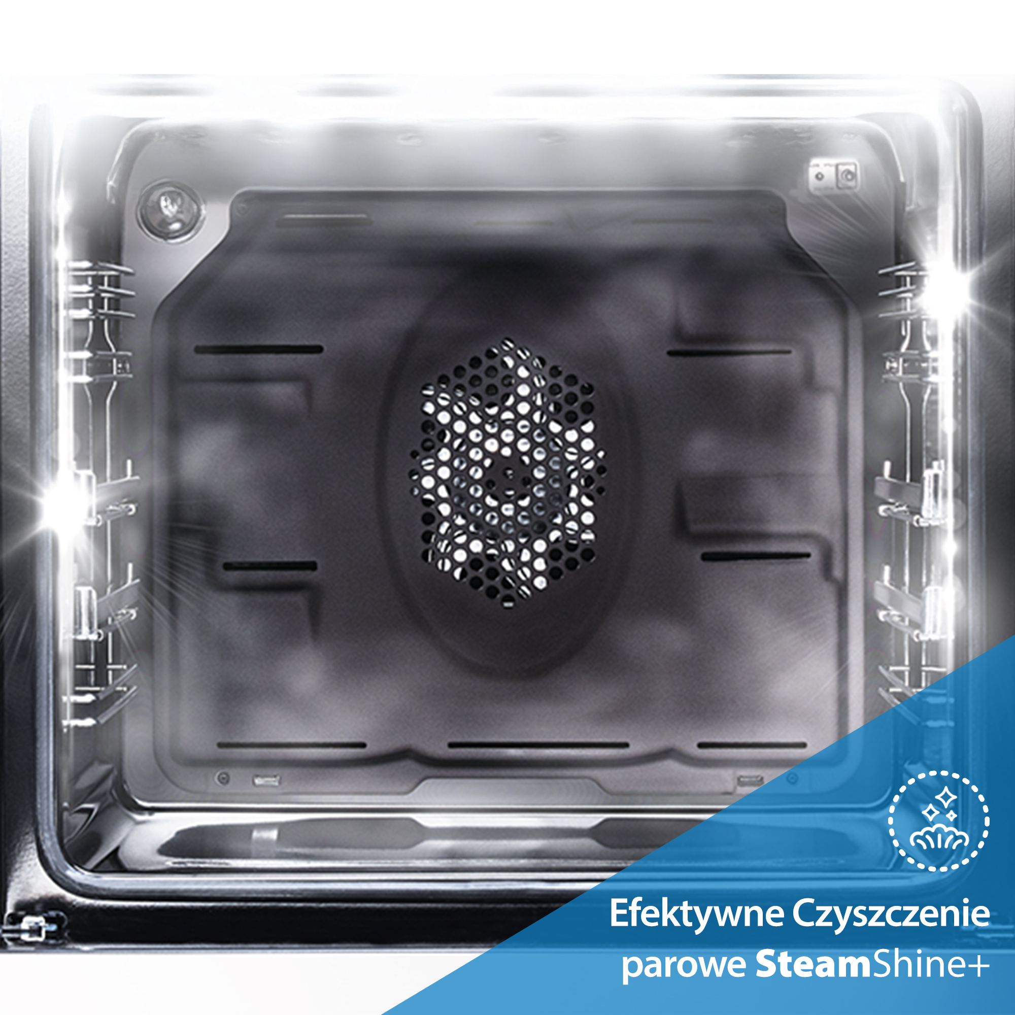 Widok wewnątrz piekarnika. Piekarnik jest oświetlony, widać metalowe ruszty i wentylator. Niebieski baner ma tekst.