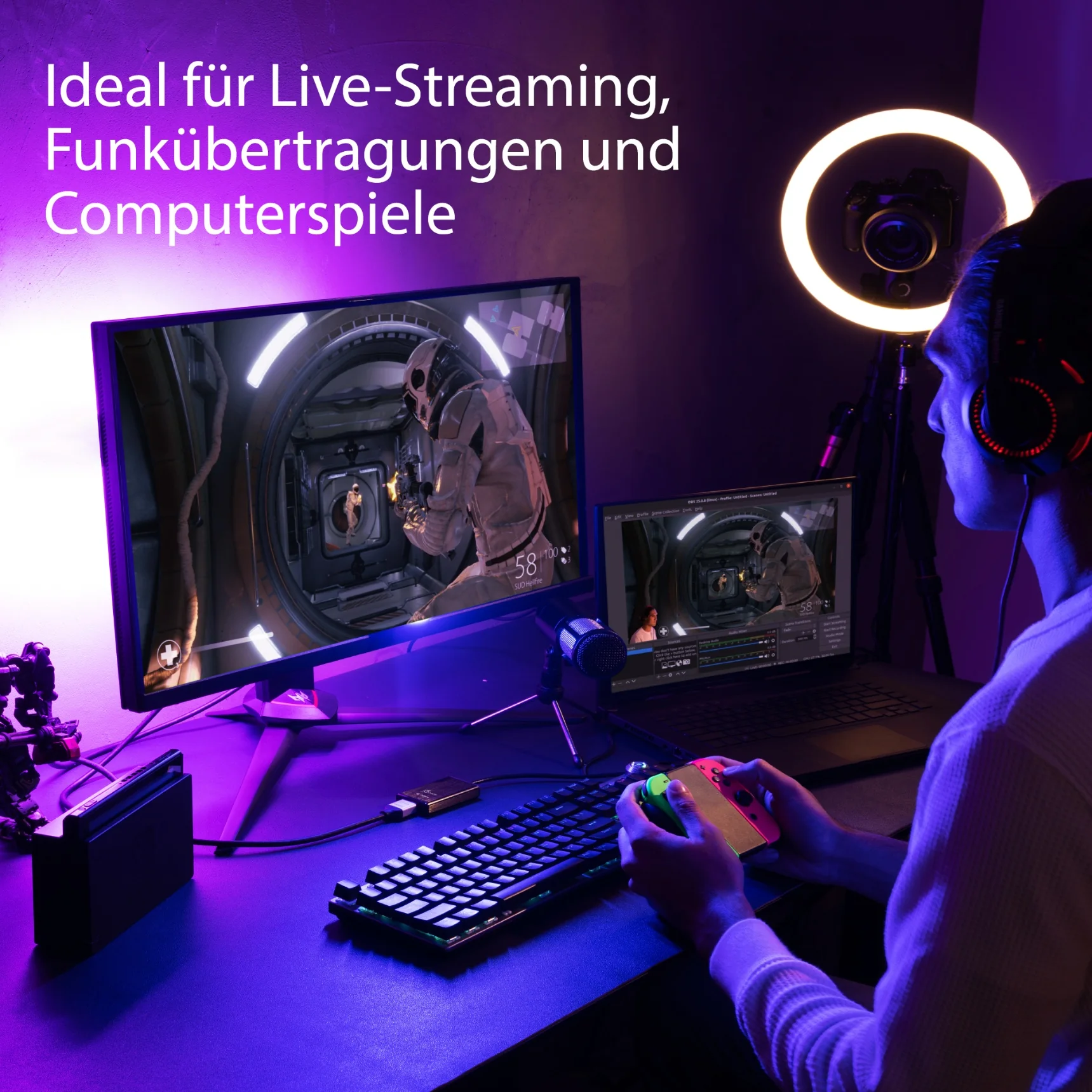Egy játékos fejhallgatóval és kontrollerrel játszik egy monitoron és laptopon, gyűrűs fénnyel egy lila fénnyel megvilágított szobában.
