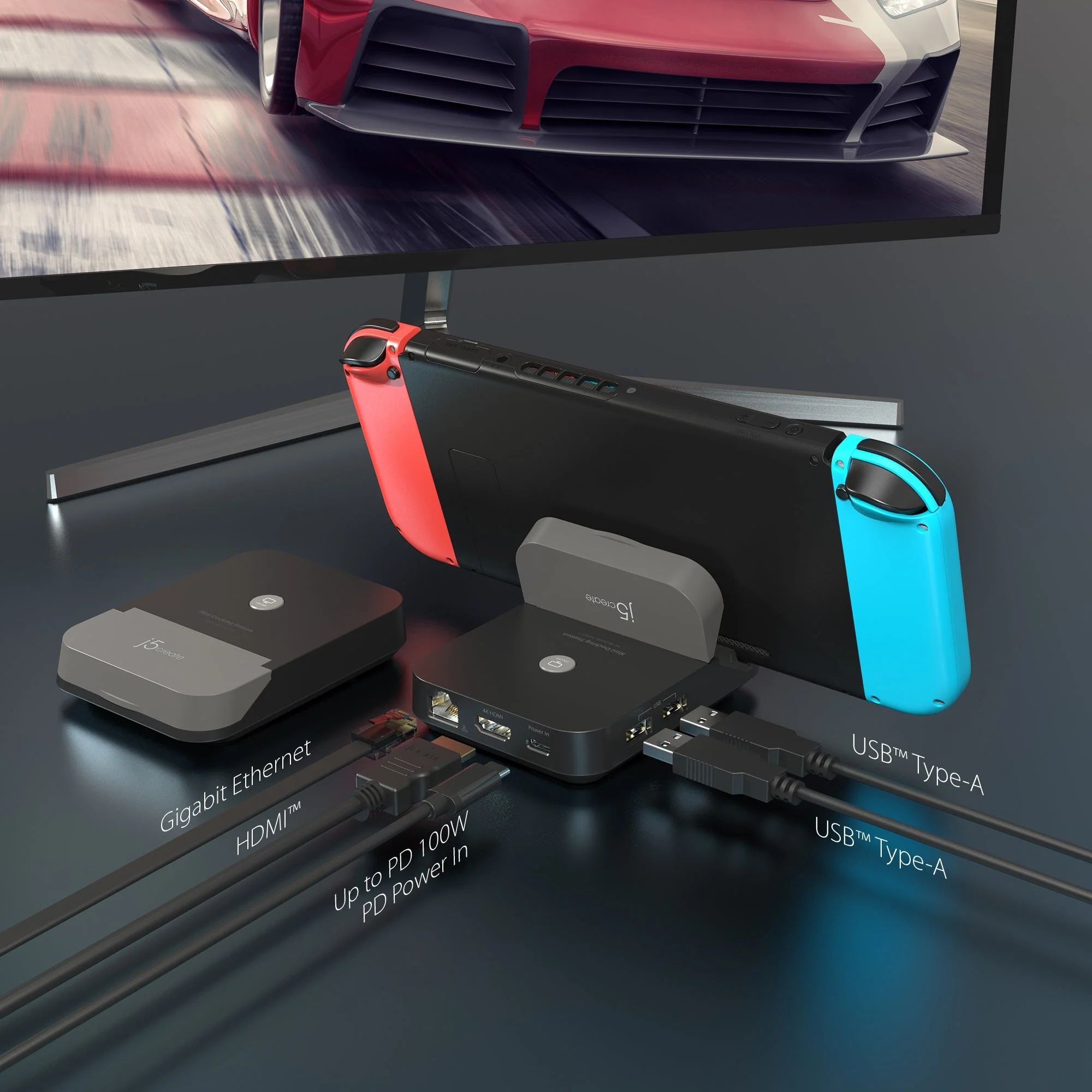 Egy Nintendo Switch egy monitorhoz csatlakoztatva, különféle kábelekkel, beleértve a HDMI-t és az USB-t.
