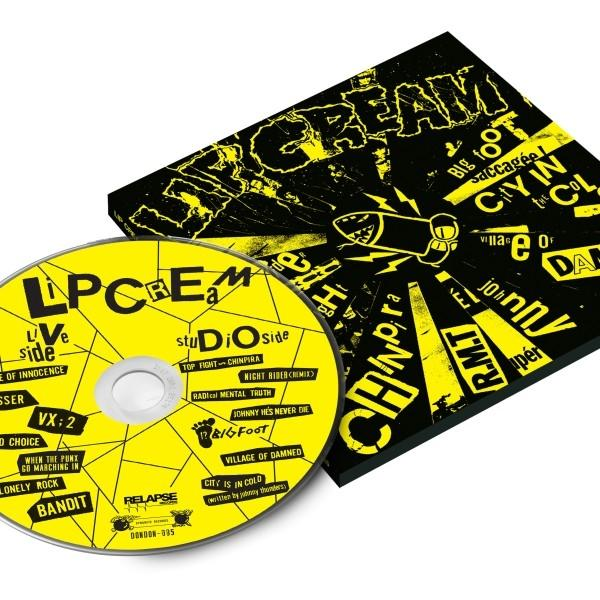 CD und Hülle mit gelbem und schwarzem Design. Text und Grafik einer cartoonartigen Figur. Die CD ist gelb.