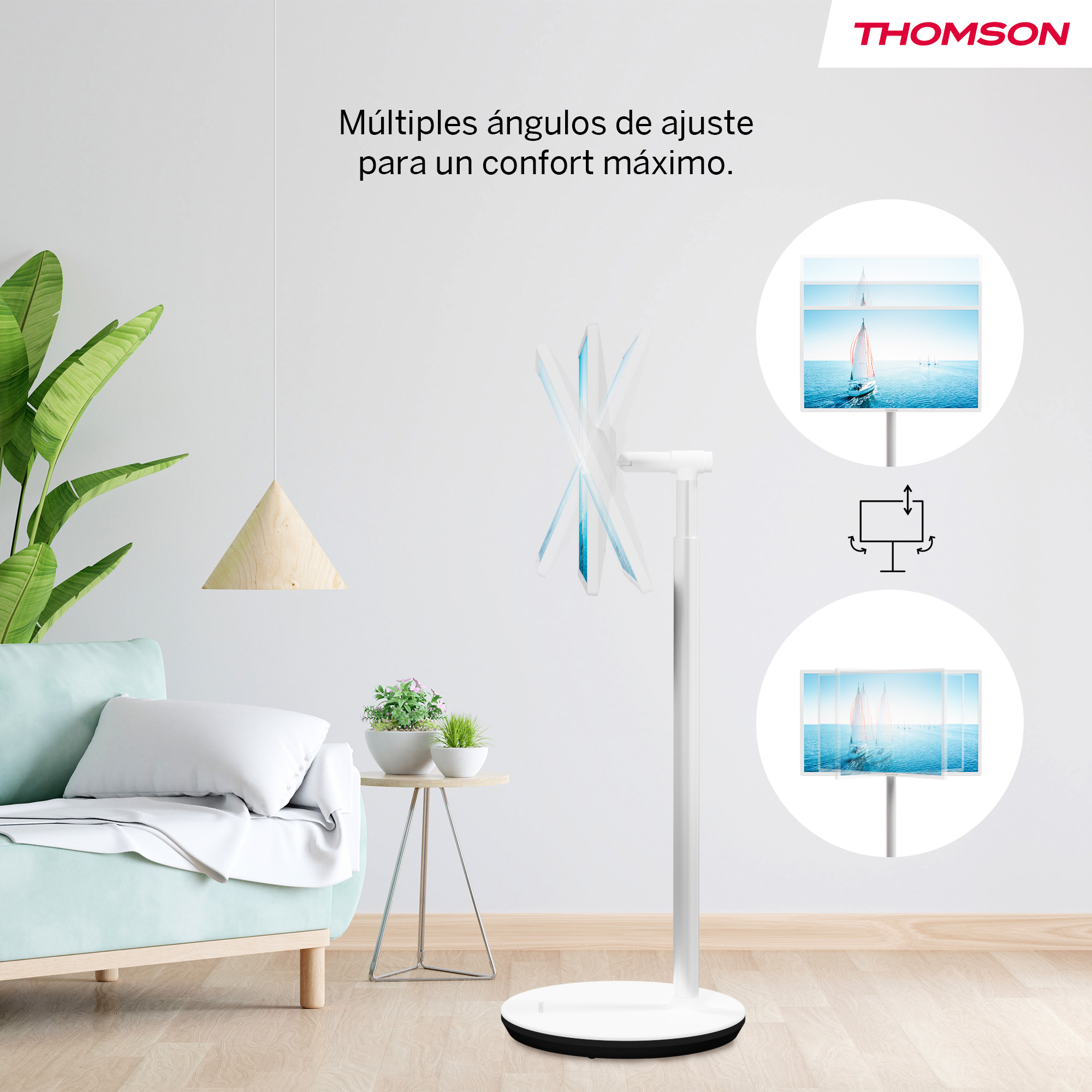 Salón con soporte de TV, ángulos ajustables. Sofá, plantas y una lámpara colgante. El televisor muestra un velero.