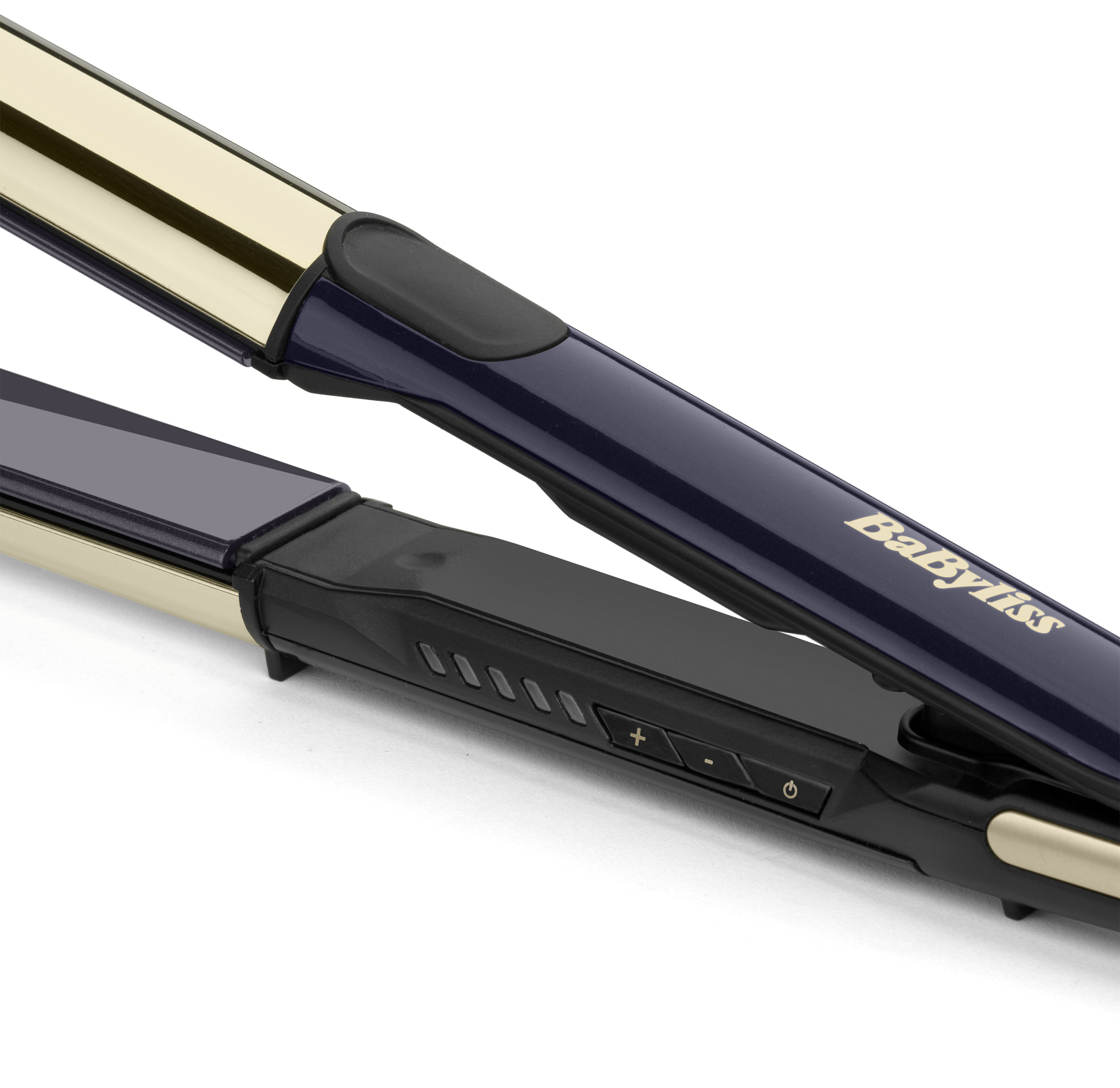A Babyliss hajvasaló közeli képe. Arany lapokkal, sötétkék és fekete fogantyúval.