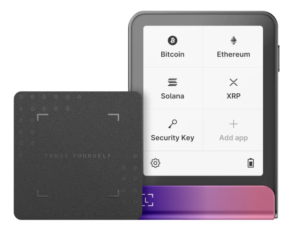 Un portafoglio hardware crypto nero e uno schermo che mostra Bitcoin, Ethereum, Solana, XRP, Security Key e le opzioni Aggiungi app.