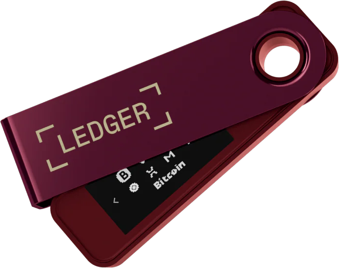 Un portefeuille matériel Ledger marron ouvert, affichant un écran avec des symboles de crypto-monnaie. Le mot LEDGER est visible.