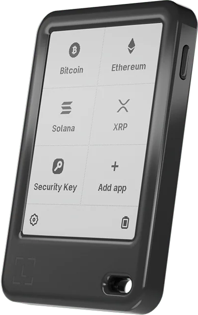 Ein schwarzes Hardware-Wallet für Kryptowährungen. Der Bildschirm zeigt Bitcoin, Ethereum, Solana, XRP, Sicherheitsschlüssel und App hinzufügen.