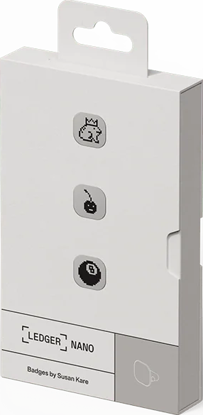 Weiße Ledger Nano-Box mit drei pixeligen Symbolen: ein Hase mit Krone, eine Kirsche und eine Billardkugel.