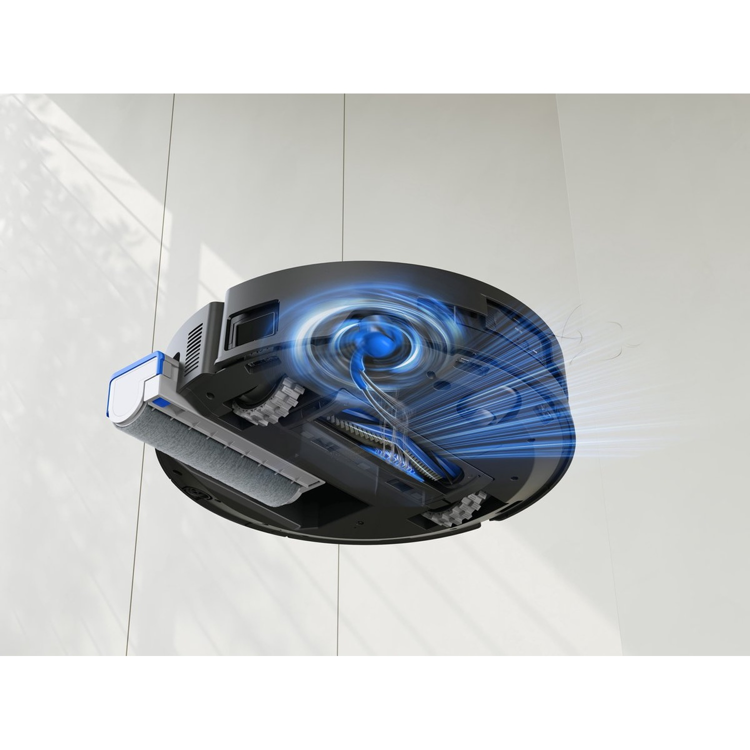 Een robotstofzuiger, zwart en blauw, wordt getoond met een transparant effect, dat de interne werking en luchtstroom laat zien.