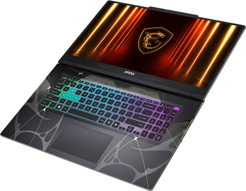Offener Laptop mit beleuchteter Tastatur. Der Bildschirm zeigt ein goldenes Drachenlogo. Die Tastatur hat farbige Lichter. Graues Design.