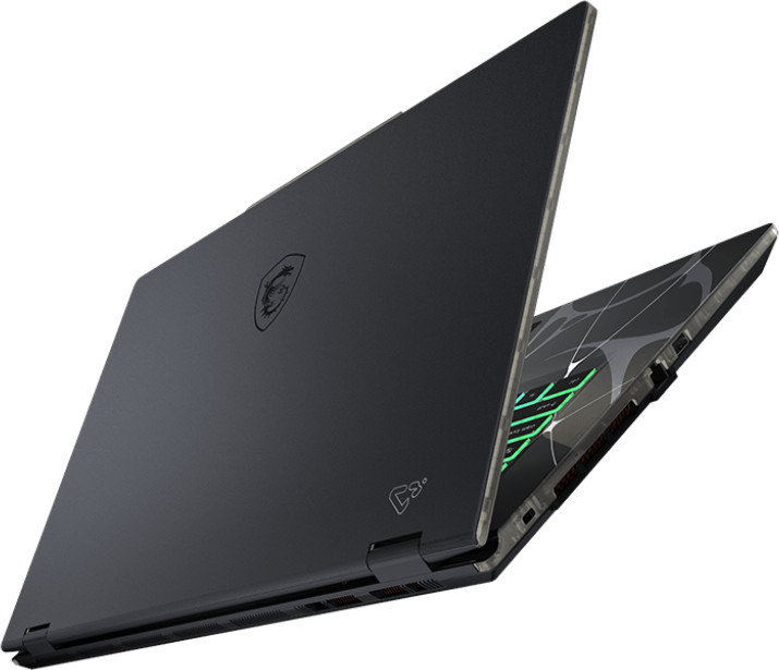 Ein dunkelgrauer Laptop ist leicht geöffnet und zeigt eine Tastatur mit grüner Hintergrundbeleuchtung. Das MSI-Logo ist sichtbar.