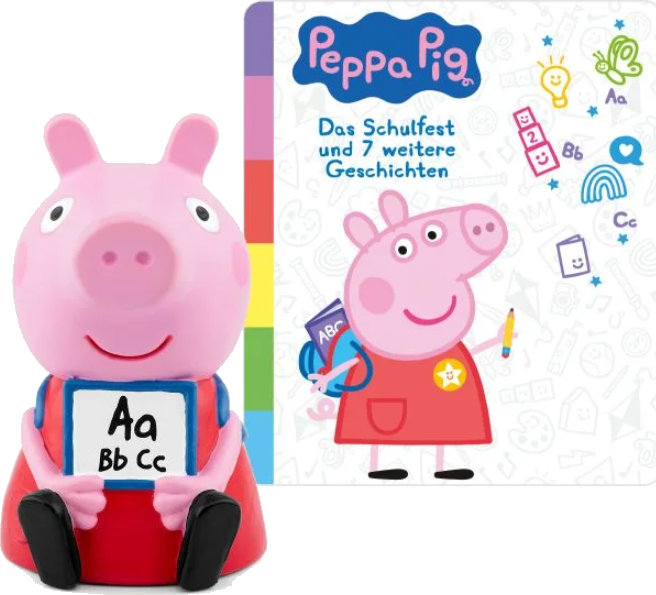 Eine Peppa Wutz-Figur hält ein Schild mit ABC. Ein Buch und ein Peppa Wutz-Bild sind daneben.
