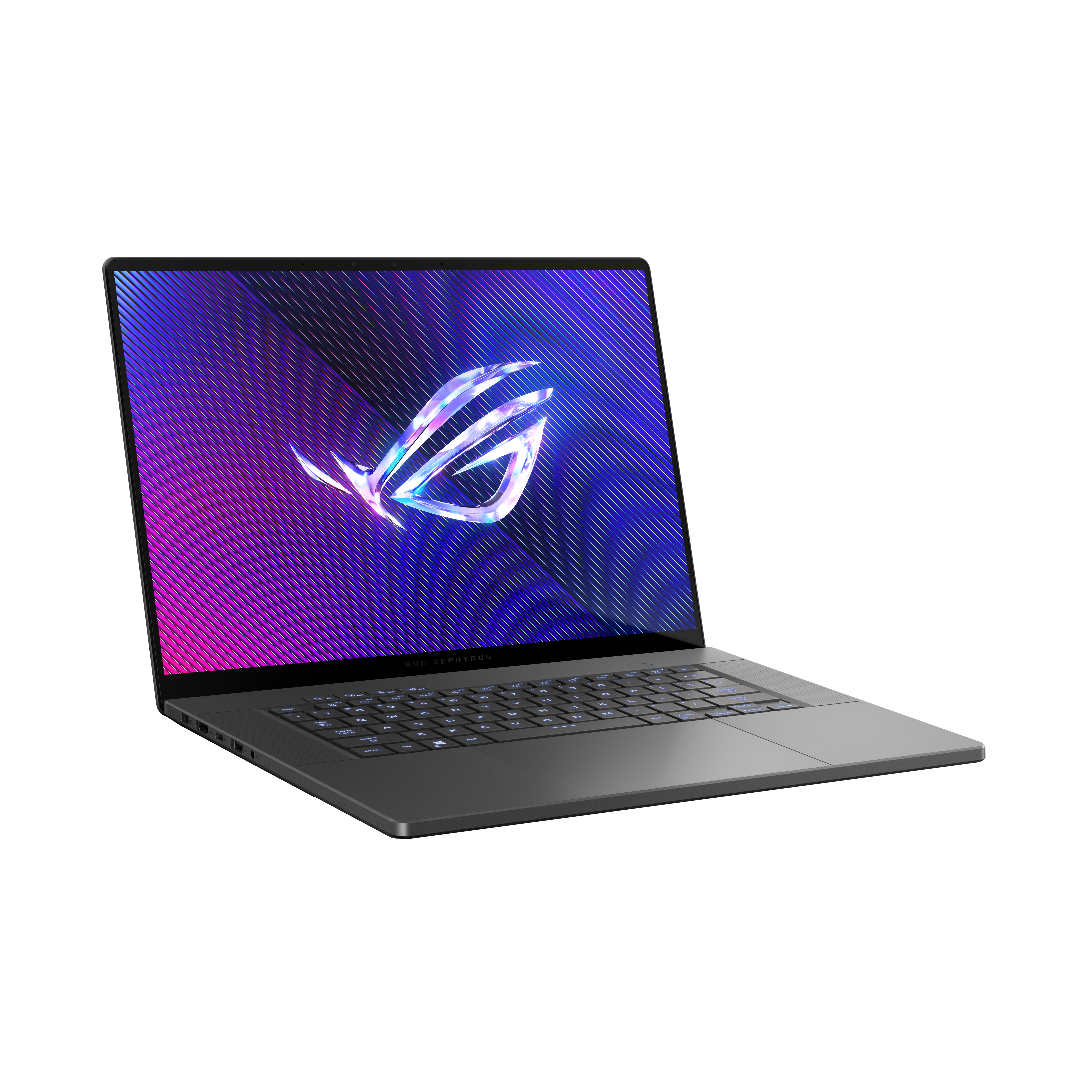Un ordinateur portable gris foncé est ouvert, affichant un logo à l'écran. L'écran a un fond dégradé violet et bleu. Clavier visible.
