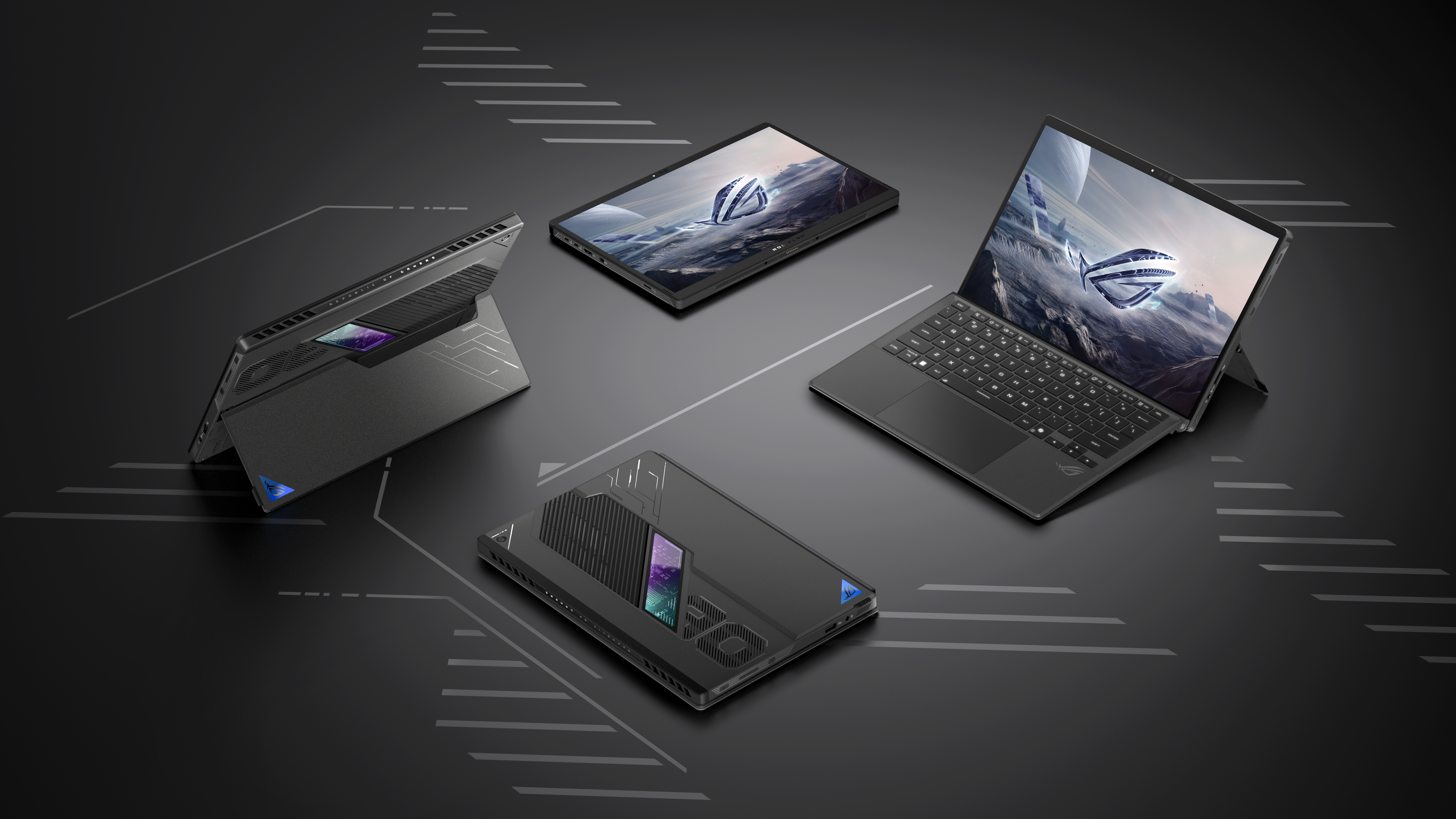 Four black laptops and tablets with screens displaying a logo on a dark surface with graphic lines.