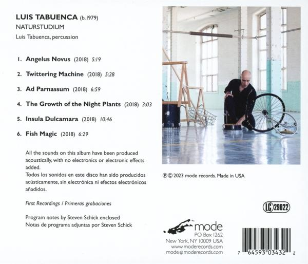 Albumcover: Mann mit Schlaginstrumenten und Fahrradrädern. Text listet Titelliste und Credits auf.