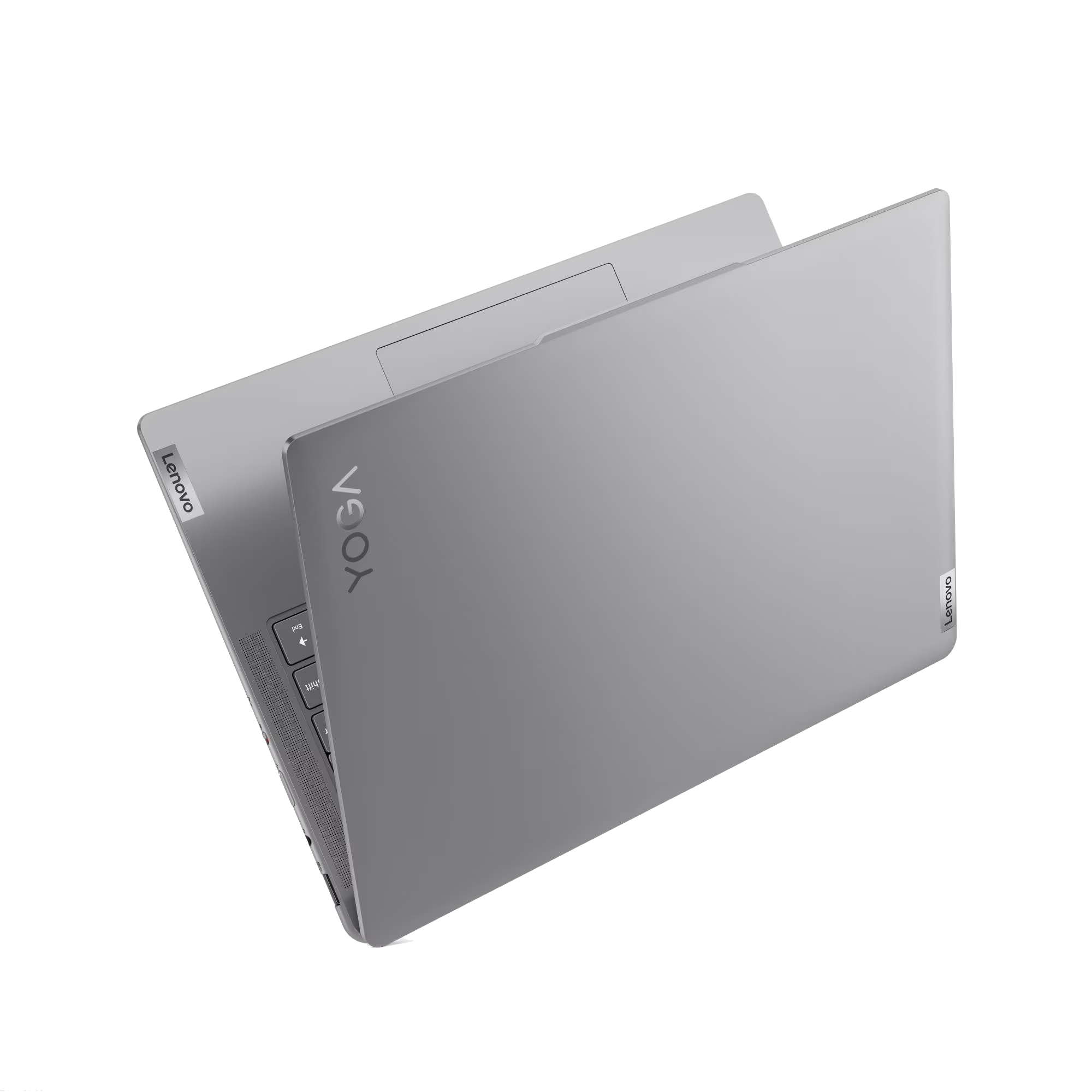 Un portátil Lenovo Yoga abierto sobre un fondo negro. El portátil es gris y se ve el logotipo de Yoga.