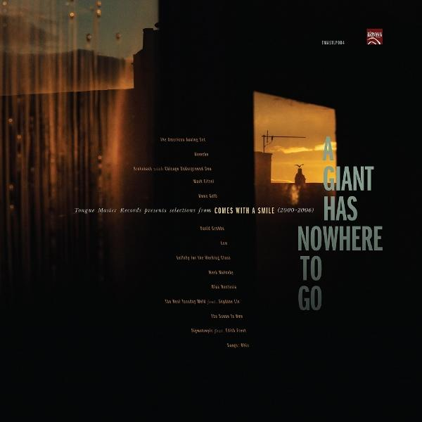 Albumcover: Gebäudesilhouetten, Text 'A Giant Has Nowhere To Go' und eine Sonnenuntergangsszene durch ein Fenster.
