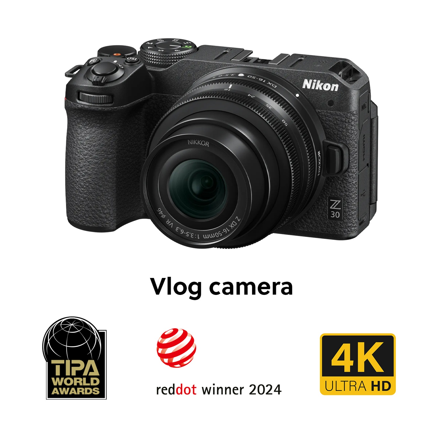 Videocamera vlog Nikon Z 30 nera con obiettivo, pulsanti e loghi. Include premio TIPA, punto rosso ed etichette 4K Ultra HD.