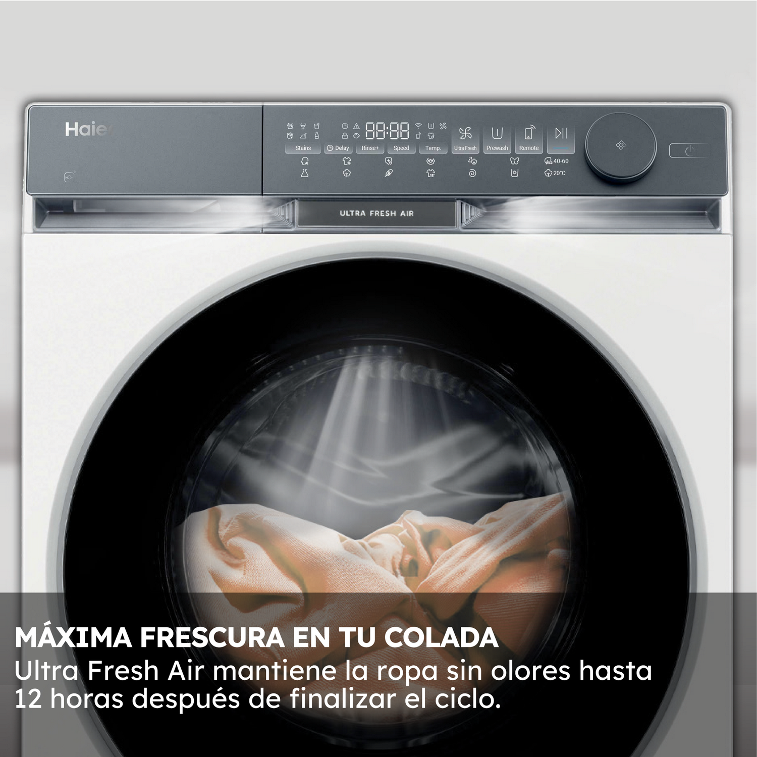 Una lavadora blanca con pantalla digital. Dentro, hay ropa. El texto dice: 'Ultra Fresh Air' y 'Máxima Frescura'.