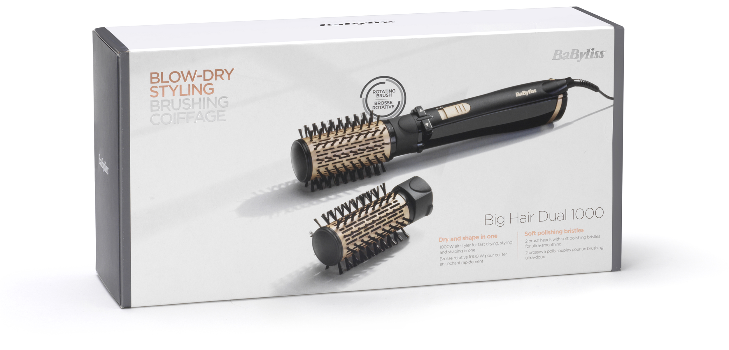 Babyliss Big Hair Dual 1000 hajformázó dobozban. Fekete-arany formázó és két kefefej fehér háttérrel.