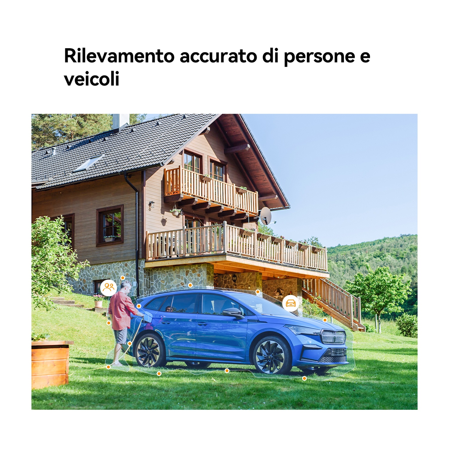 Un'auto blu è parcheggiata di fronte a una casa. Un uomo è in piedi vicino all'auto e la casa ha un balcone in legno.