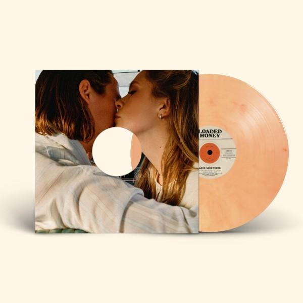 Albumcover: Zwei küssende Personen, rechts eine Schallplatte. Platte pfirsichfarben, Album ist LOADED HONEY.