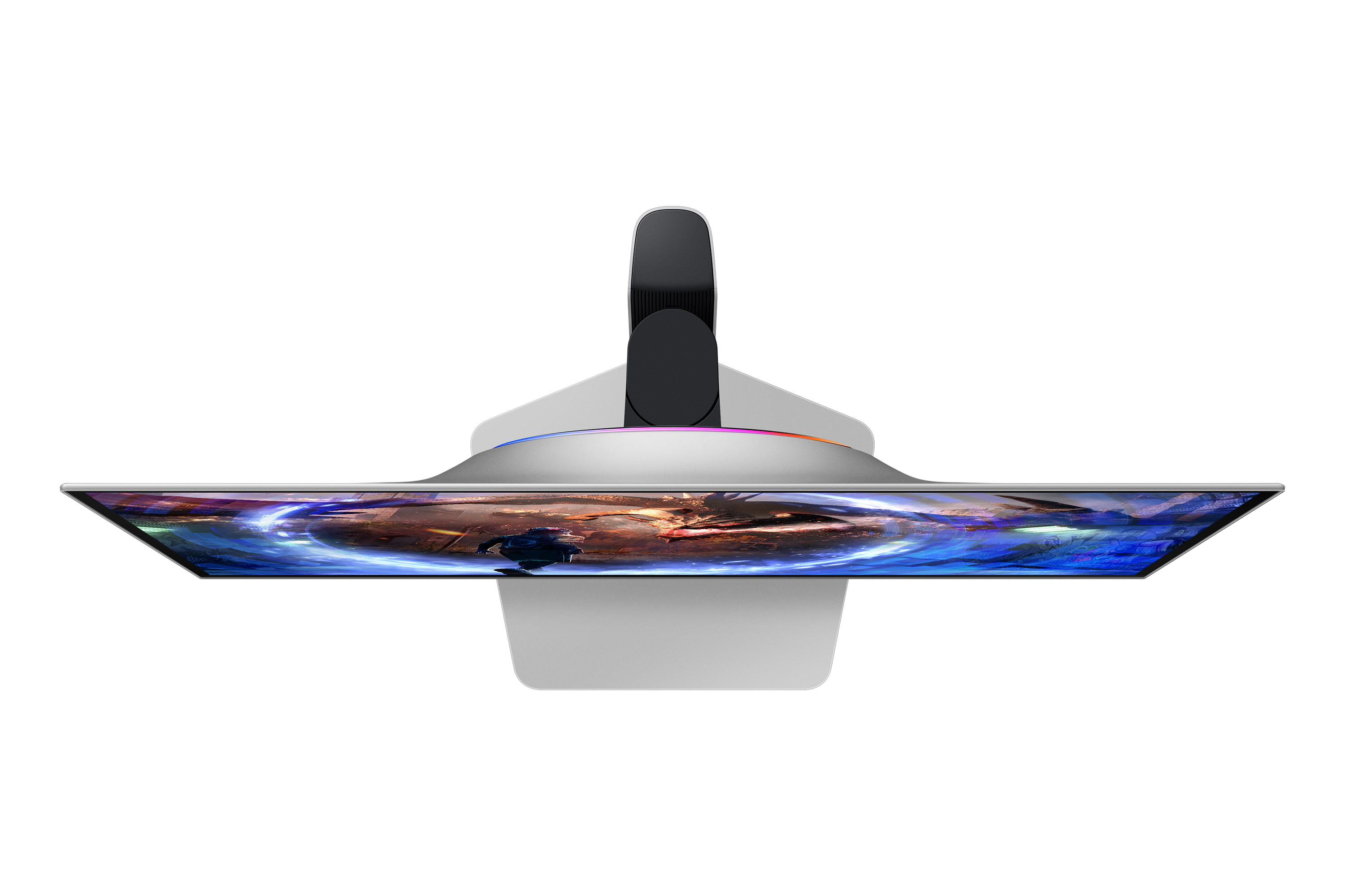 Widok z góry na monitor komputera z wyświetloną grą. Monitor jest srebrny i czarny, na czarnym tle.