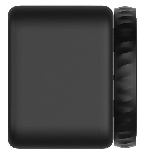 Czarny prostokątny obiekt z zaokrąglonymi rogami i żebrowanym cylindrycznym elementem przymocowanym po prawej stronie.