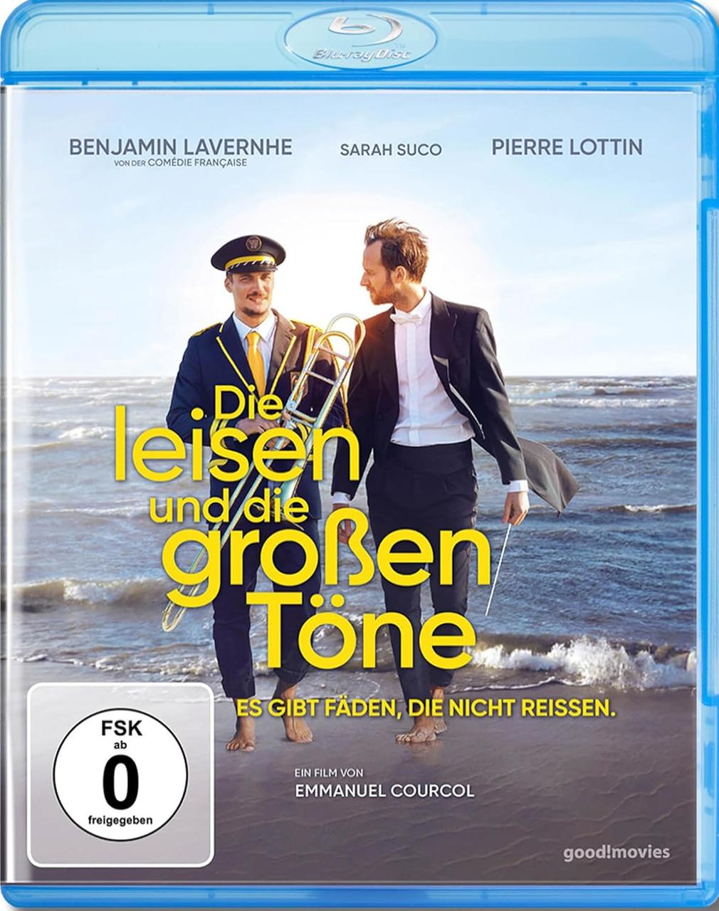 Blu-ray-Cover. Zwei Männer stehen am Strand, einer in Uniform, der andere im Anzug. Text: Die leisen und die großen Töne.