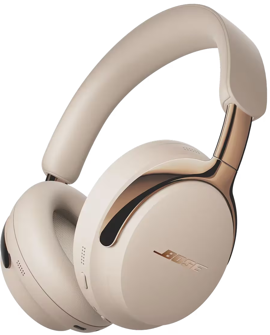 Cuffie Bose color crema. Dettagli dorati sui padiglioni e sull'archetto. Logo Bose visibile. Sfondo nero.