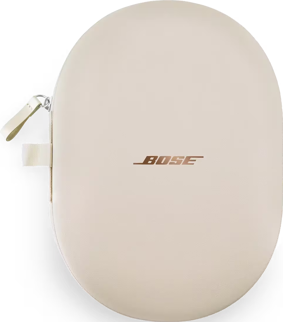 Custodia per cuffie Bose ovale color crema con cerniera e manico. Il logo Bose è dorato.