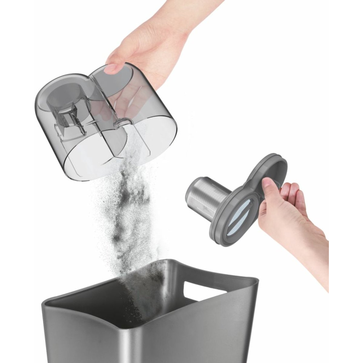 Hands emptying a transparent dustbin container into a grey bin, also holding a filter. Dust is falling. White background.