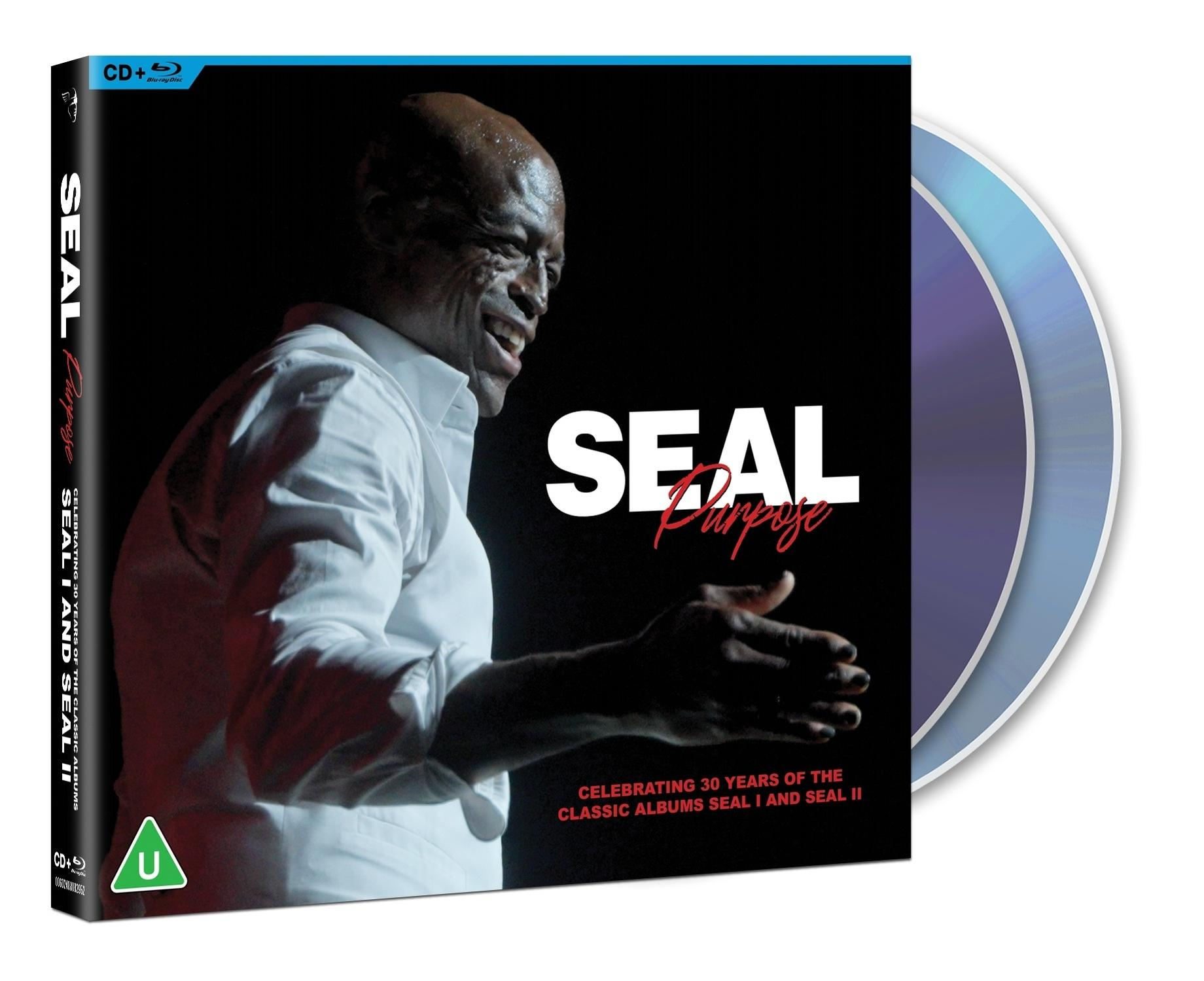 Albumcover: Sänger Seal auf der Bühne, lächelnd. Der Albumtitel lautet 'Seal Purpose'. Feiert 30 Jahre seiner Alben.