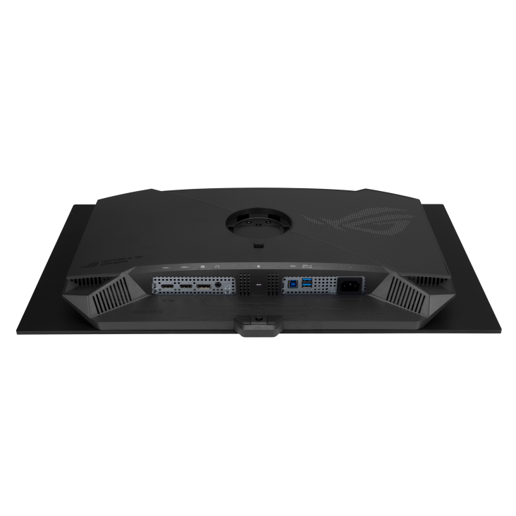 Die Rückseite eines schwarzen Computermonitors. Anschlüsse, Lüfter und das ROG-Logo sind sichtbar. Der Monitor steht auf einer schwarzen Oberfläche.