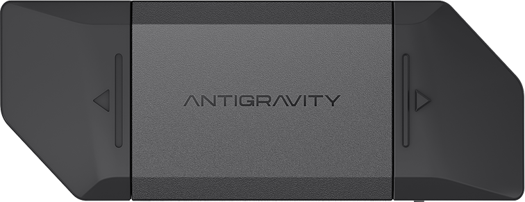 Ein graues Gerät mit schwarzen Seiten. In der Mitte ist 'ANTIGRAVITY' eingeprägt. Pfeile an den Seiten deuten auf Schieben hin.