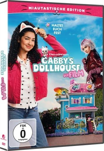 DVD-Cover von Gabbys Puppenhaus. Zeigt eine Frau mit Katzenohren, ein Puppenhaus und eine andere Frau. Der Himmel ist blau und das Cover ist rosa.