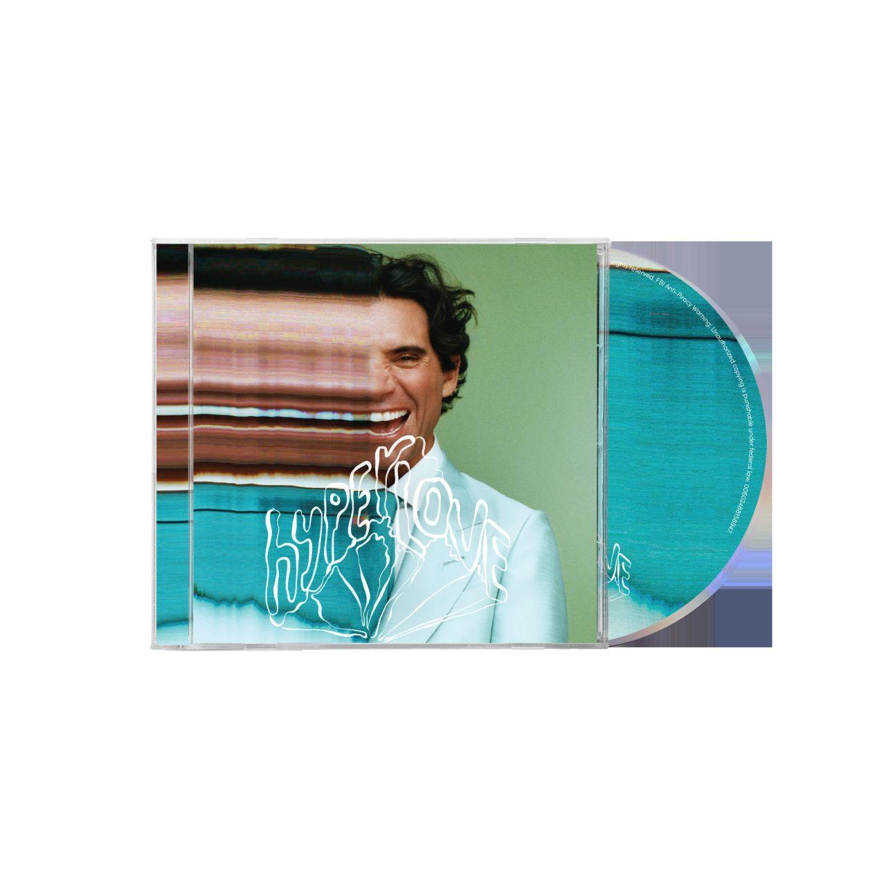 CD-Cover. Lachender Mann im Anzug. Text 'Hype Love'. Glitch-Effekt links. Türkis und Grün.