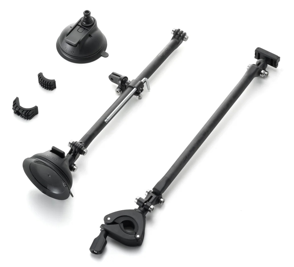 Czarne uchwyty i akcesoria do kamery na białym tle. Zawiera przyssawki, pręty i wsporniki montażowe.