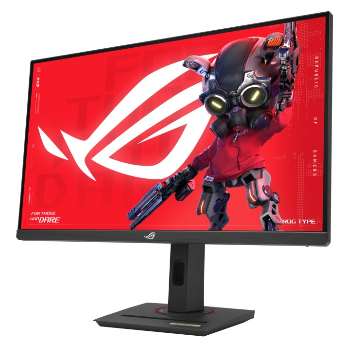 Monitor wyświetla czerwone tło z postacią trzymającą broń. Logo ROG jest widoczne. Monitor ma czarną podstawę.