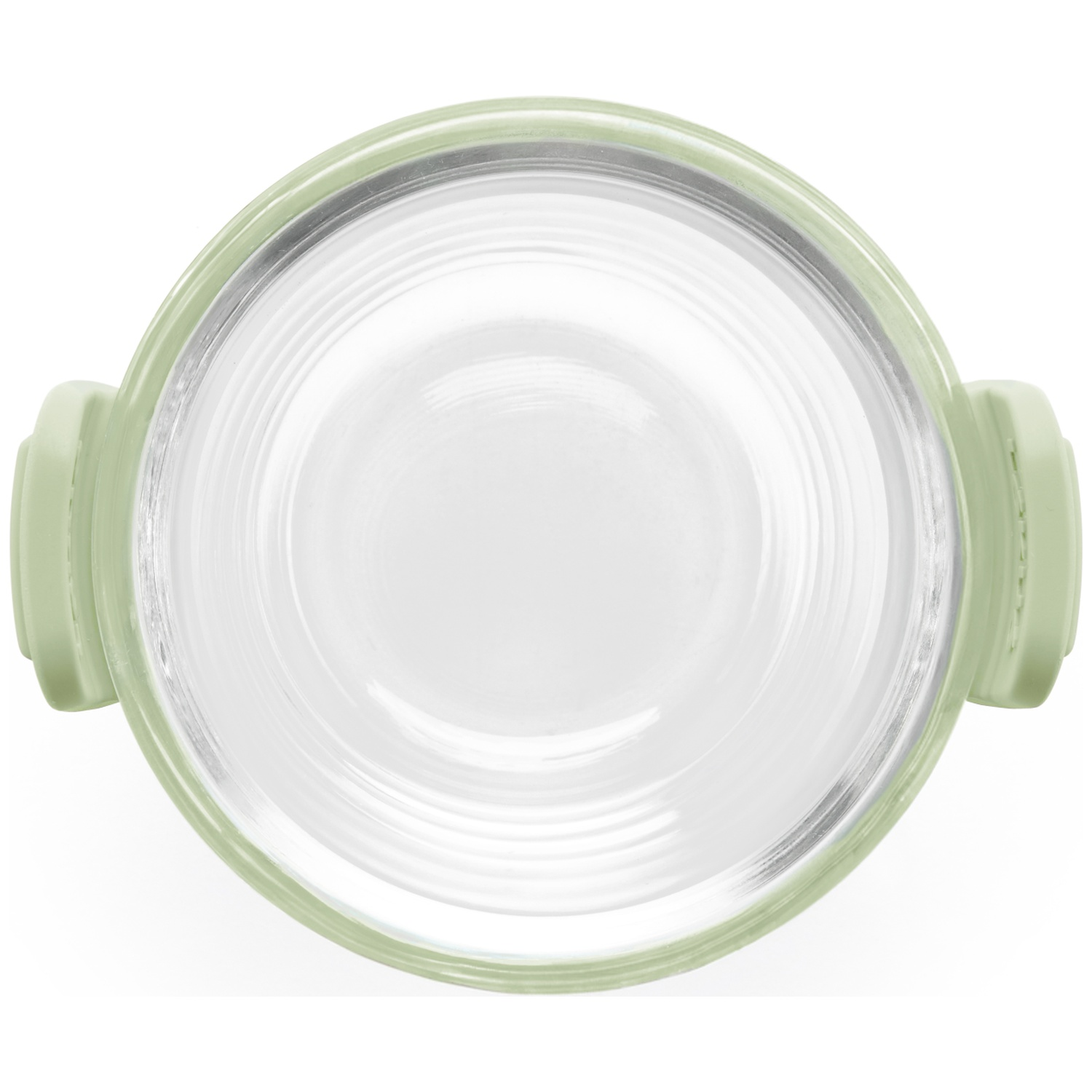 Bovenaanzicht van een ronde, heldere glazen container met een lichtgroene rand en handgrepen. Witte achtergrond.