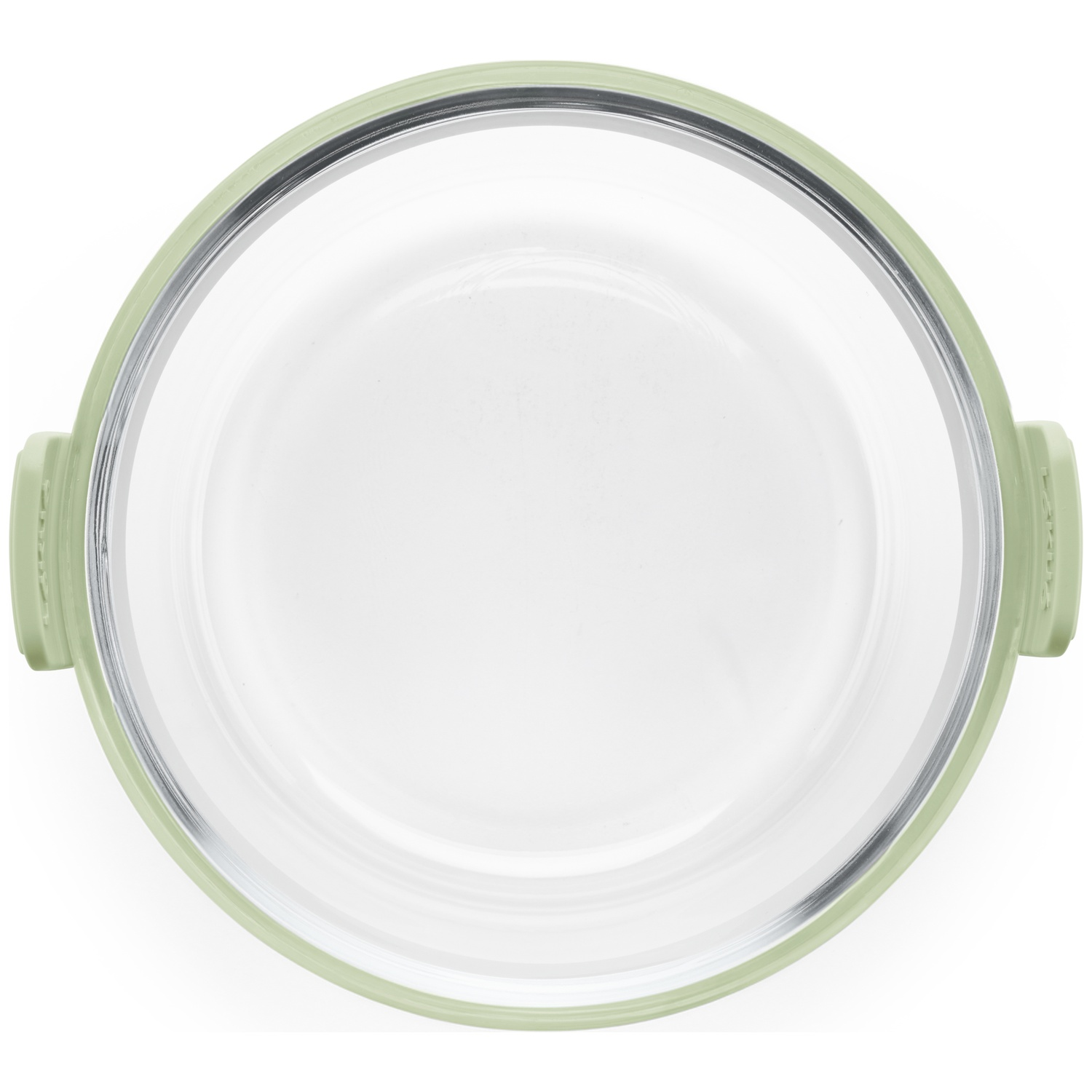 Overhead view of a glass bowl with a light green rim and handles. The bowl is clear, and sits on a white background.