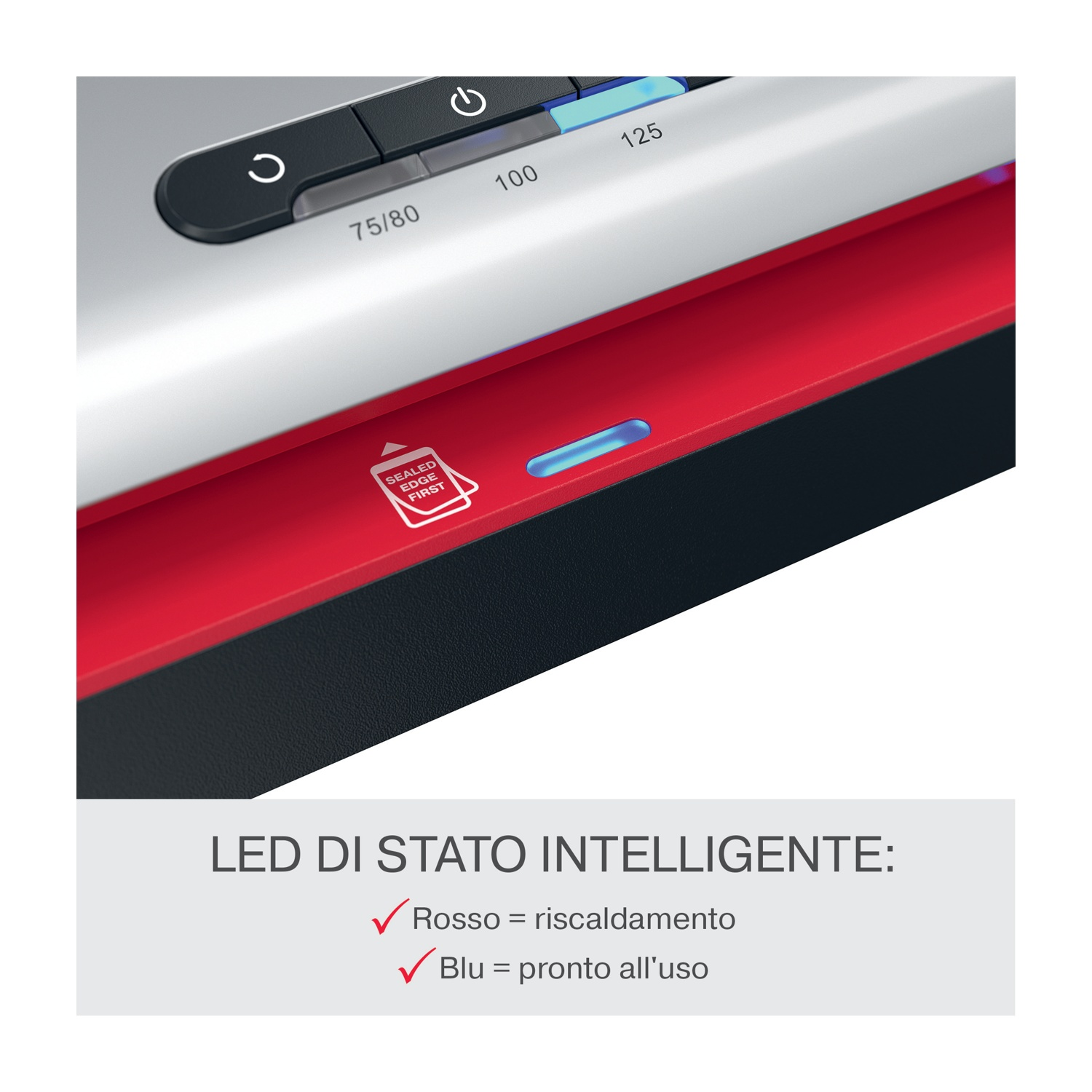Primo piano di una plastificatrice con dettagli rossi e neri. Sono visibili controlli e luci, con testo che indica lo stato di riscaldamento e pronto.