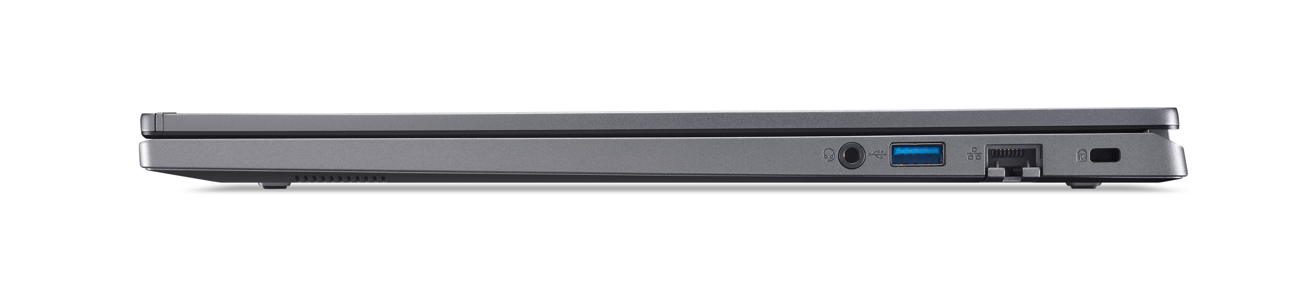 Vue latérale d'un ordinateur portable gris montrant les ports, dont USB, audio et réseau. Fond blanc.