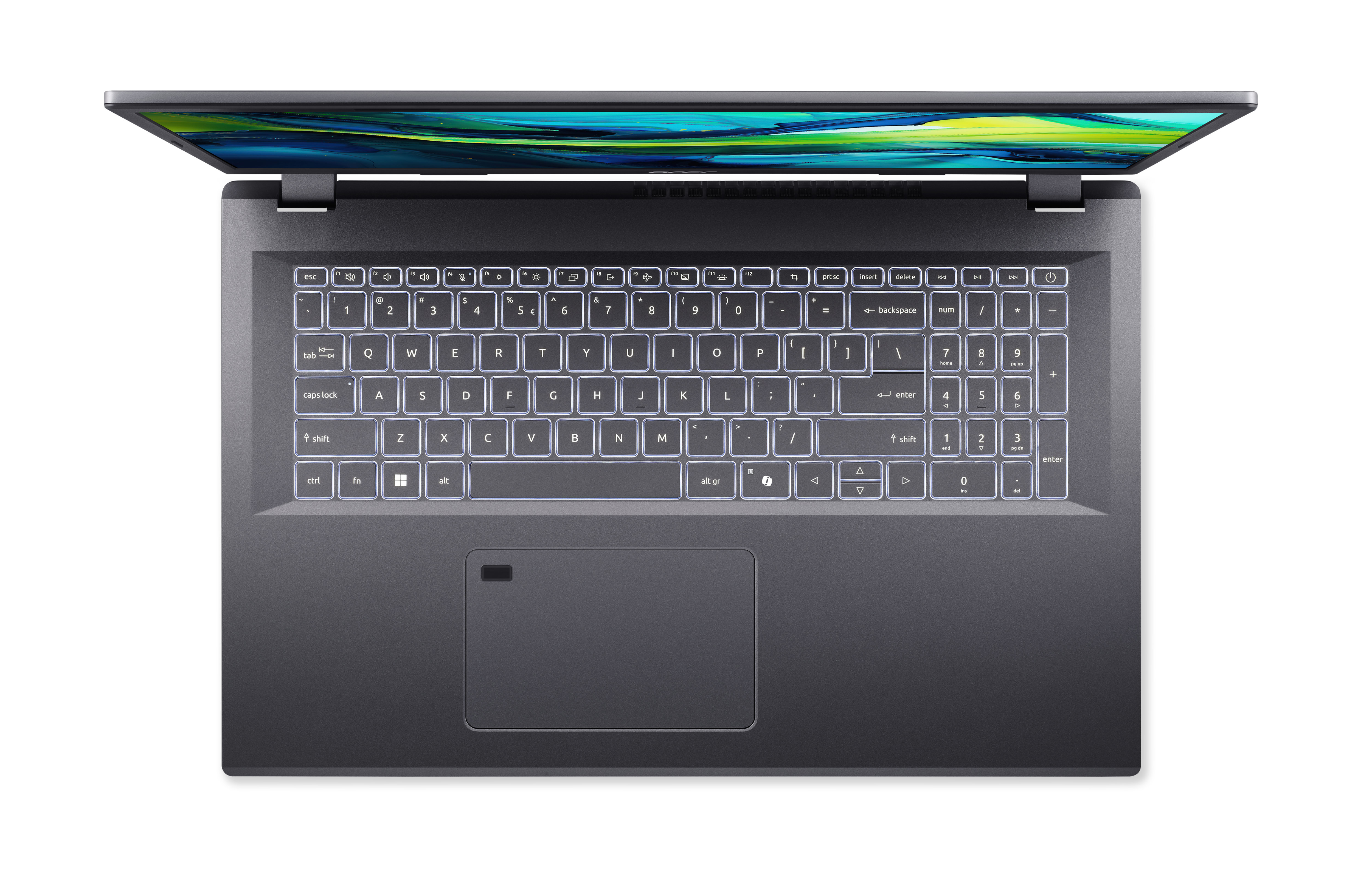 Vue de dessus d'un ordinateur portable avec clavier rétro-éclairé. L'écran est ouvert. Le clavier est argenté.