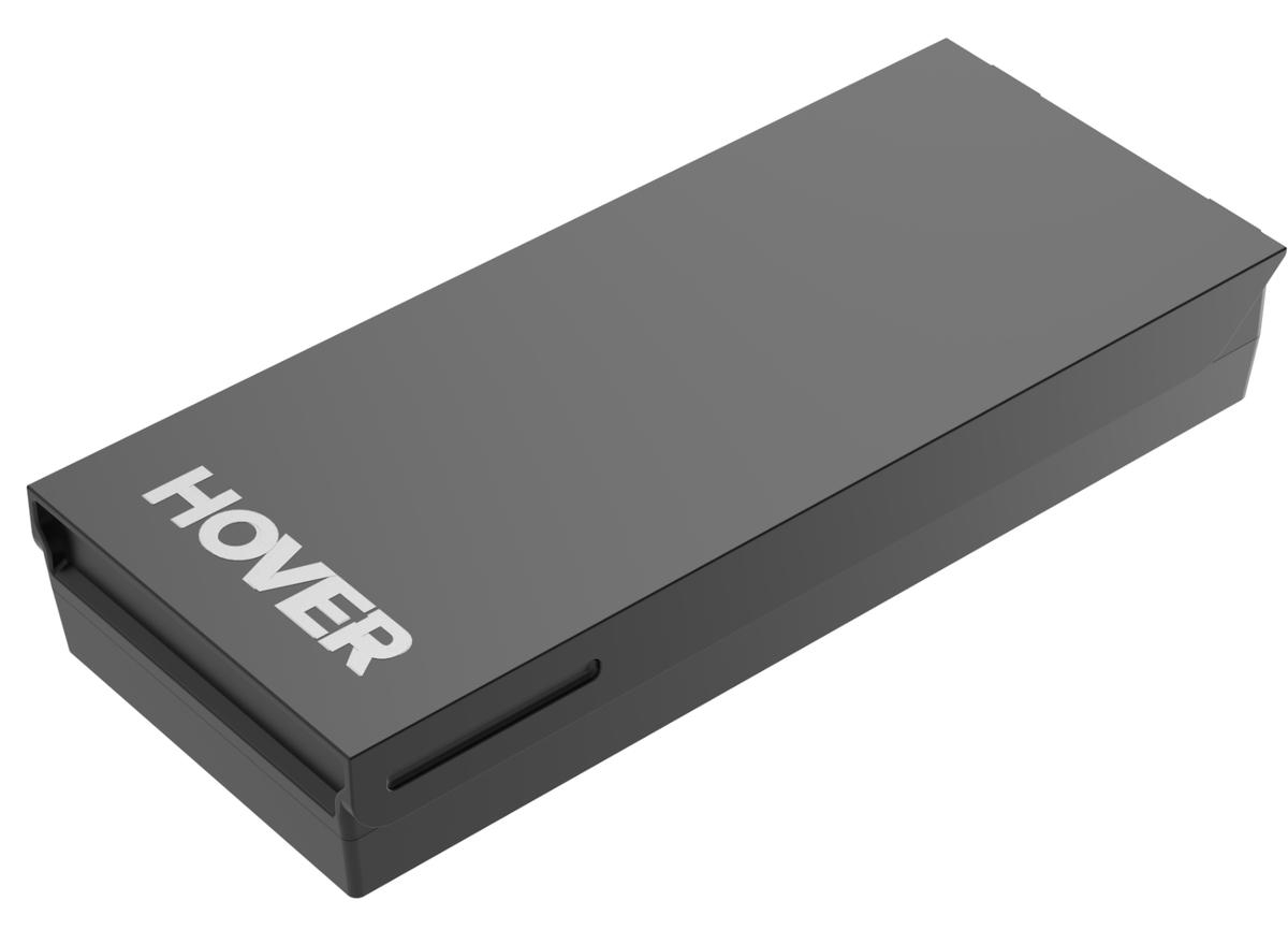 Ein schwarzes rechteckiges Gerät mit dem Wort 'HOVER' in weißen Buchstaben darauf.