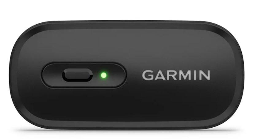 Czarne urządzenie Garmin z przyciskiem i zielonym światłem. Słowo GARMIN jest napisane na biało.