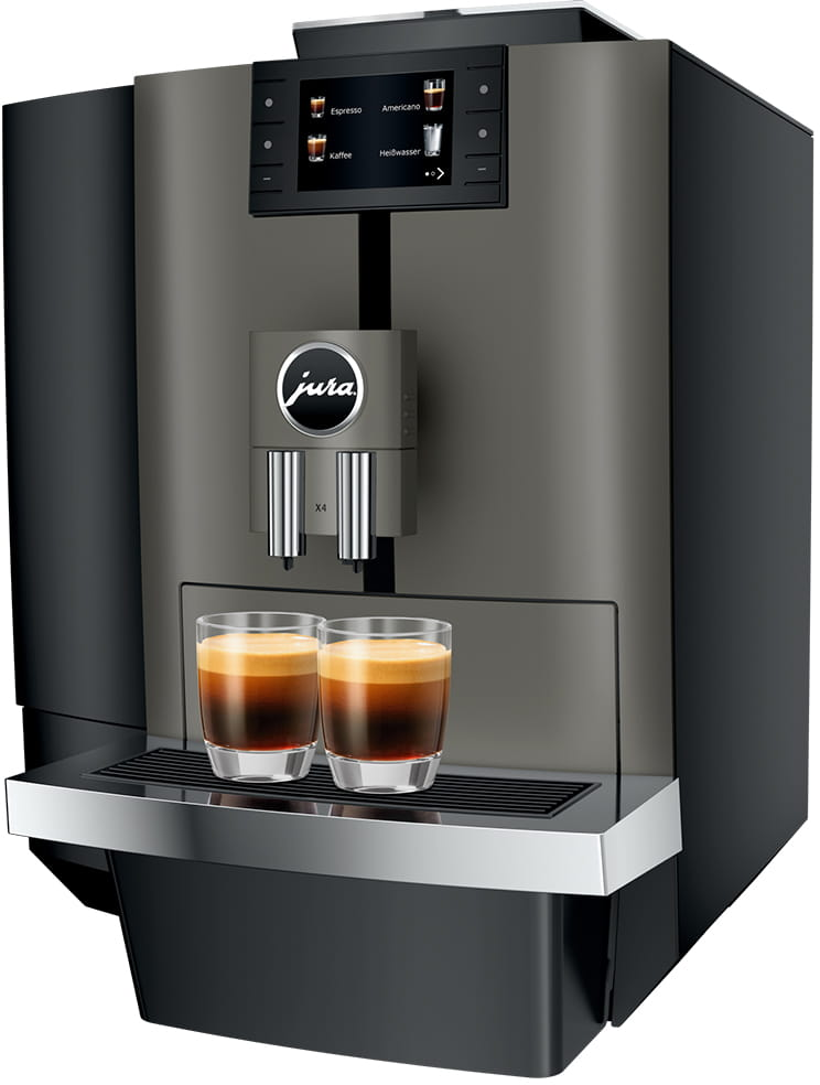 Una macchina da caffè con due bicchieri di espresso. Ha uno schermo e un logo che dice 'jura'. La macchina è grigia e nera.